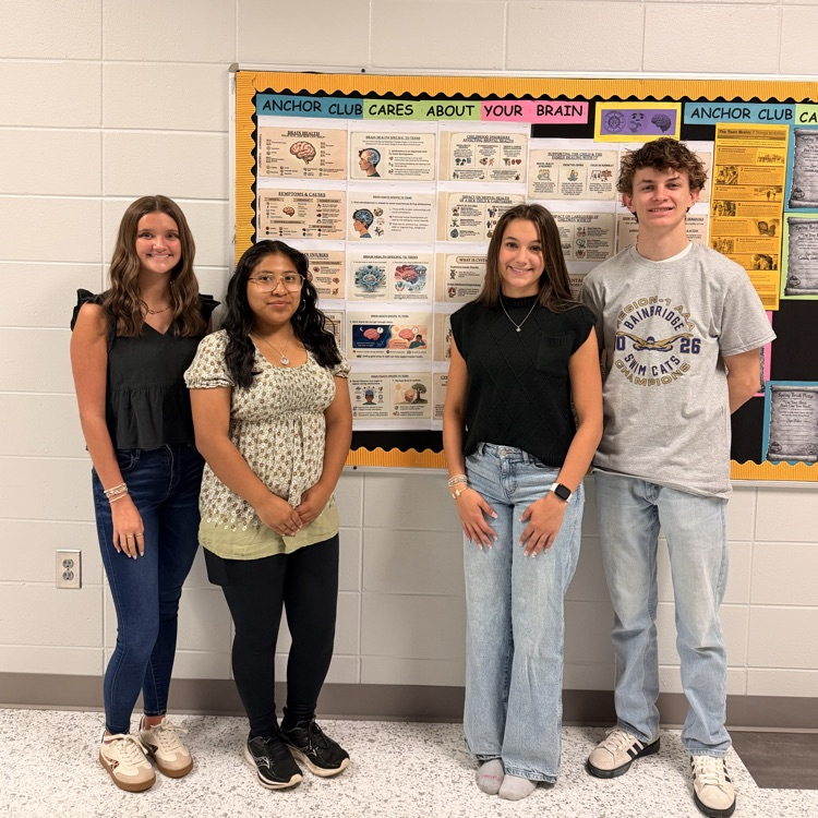 Anchor officers show off their brain health bulletin board during brain health awareness month. 