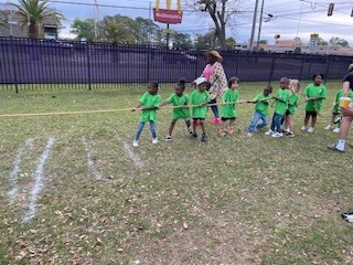 Mrs. Reynolds class enjoying beautiful weather for a picnic lunch