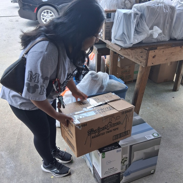 Anchor Member Angelica DeJesus dropped off donations at the Salvation Army. 