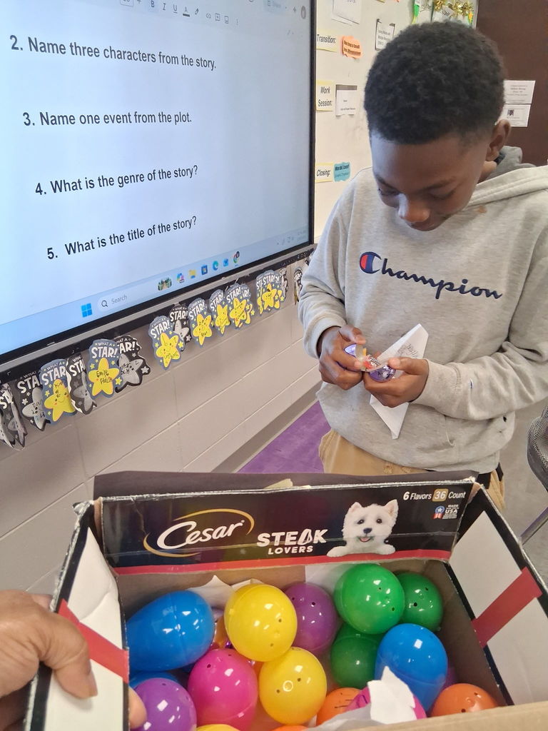 Student selecting his prize egg for a question answered correctly. 