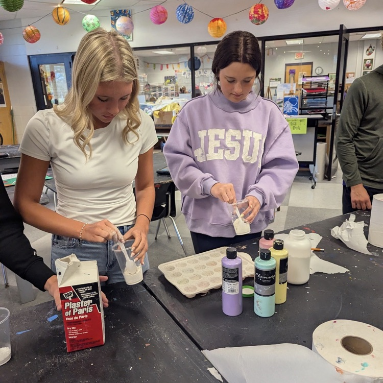 Mr. Kelley's chemistry class performed a percent yield lab with calcium carbonate, then joined up with Mrs. Cole's art class to make colorful homemade chalk they then used to decorate the sidewalks