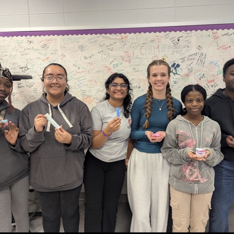 Mr. Kelley's chemistry class performed a percent yield lab with calcium carbonate, then joined up with Mrs. Cole's art class to make colorful homemade chalk they then used to decorate the sidewalks