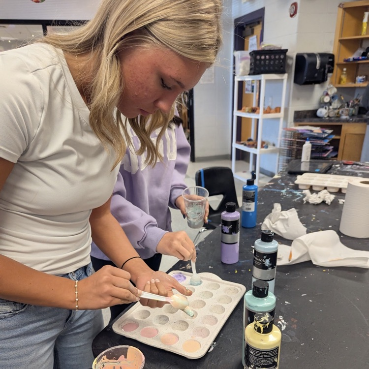 Mr. Kelley's chemistry class performed a percent yield lab with calcium carbonate, then joined up with Mrs. Cole's art class to make colorful homemade chalk they then used to decorate the sidewalks