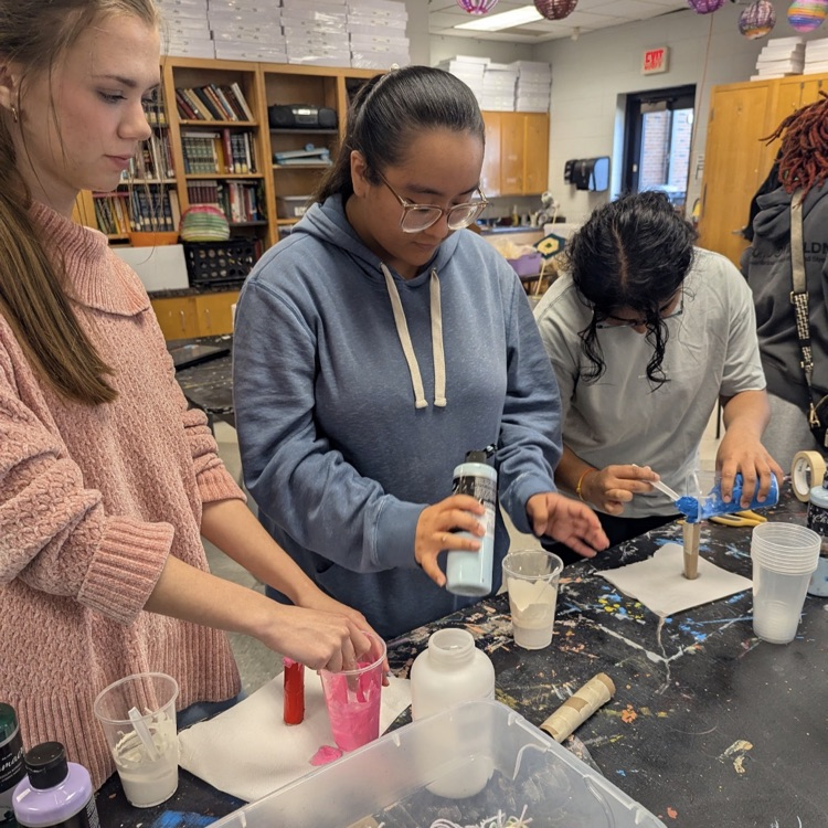 Mr. Kelley's chemistry class performed a percent yield lab with calcium carbonate, then joined up with Mrs. Cole's art class to make colorful homemade chalk they then used to decorate the sidewalks