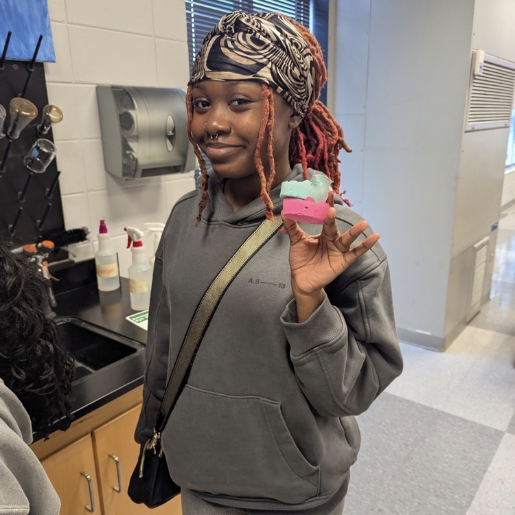 Mr. Kelley's chemistry class performed a percent yield lab with calcium carbonate, then joined up with Mrs. Cole's art class to make colorful homemade chalk they then used to decorate the sidewalks