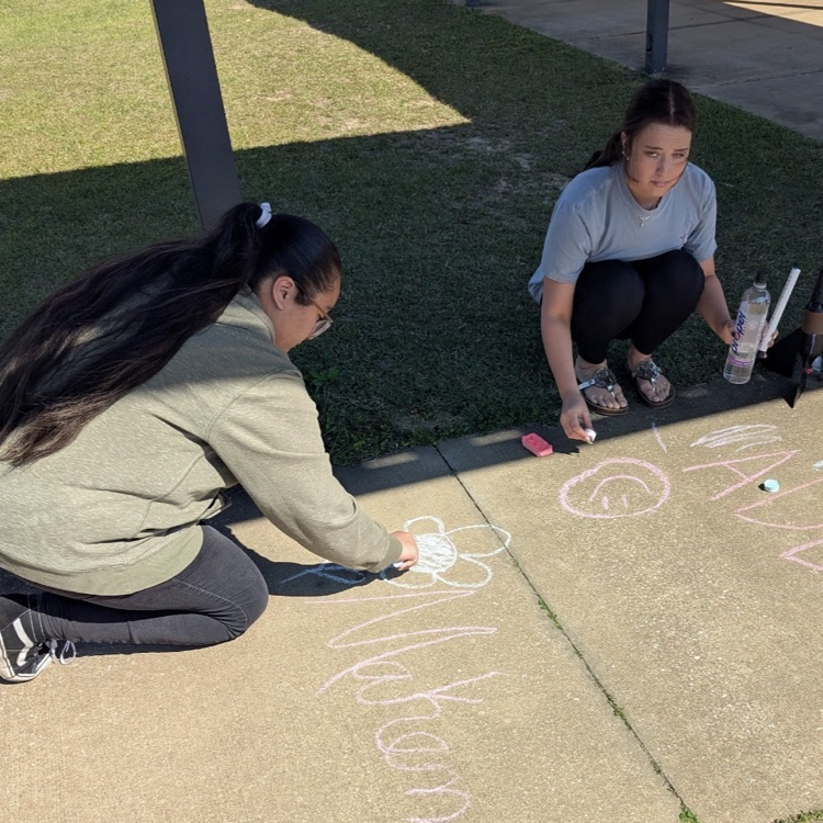 Mr. Kelley's chemistry class performed a percent yield lab with calcium carbonate, then joined up with Mrs. Cole's art class to make colorful homemade chalk they then used to decorate the sidewalks