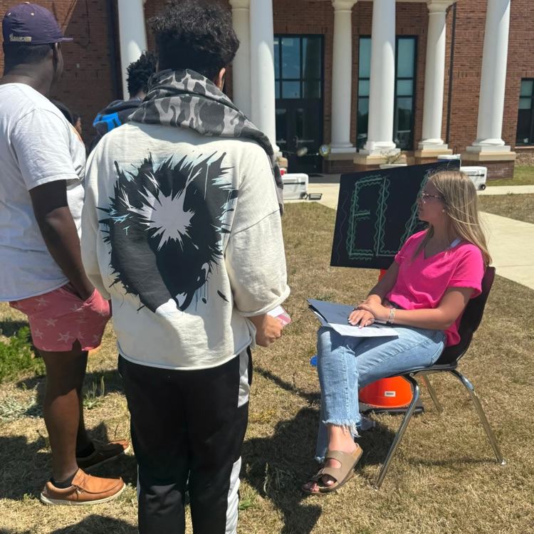 Anchor Club and Key Club members and basketball cheerleaders belped with the BMS Decathlon. 