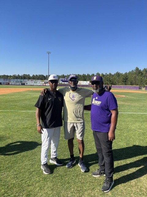 Alum Ernest Riles with his brother Gary Riles, and head coach/nephew Ryan Riles.