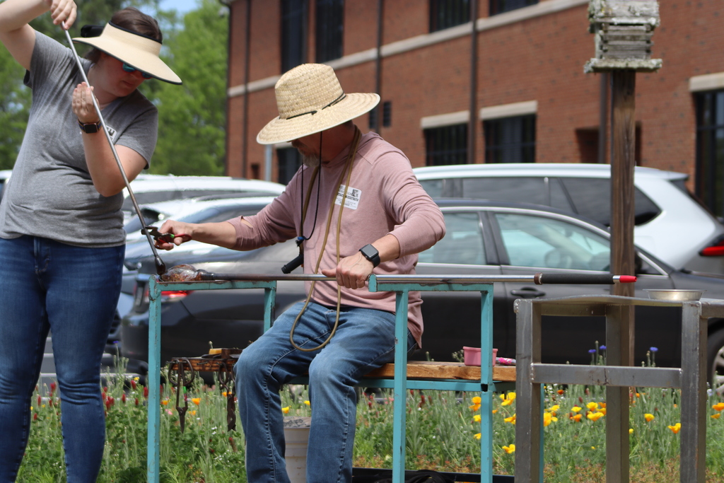 student engage with glass blowing demo at bhs