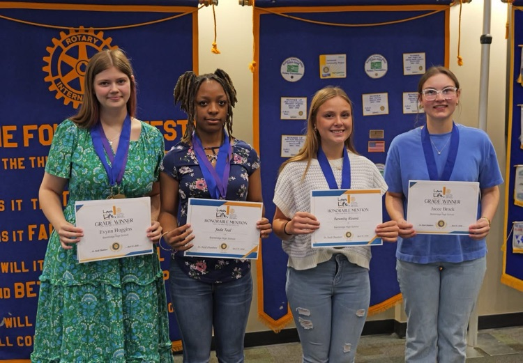 Serenity Rivera (9th grade Honorable Mention ), Jada Teal (10th grade Honorable Mention), Evynn Huggins (11th grade Winner) and Jacee Brock (12th grade and School Winner) read their Laws of Life essays to Rotary on Tuesday. 