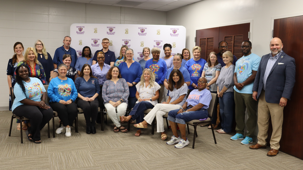Group of Decatur County Schools staff dressed in blue for autism awareness