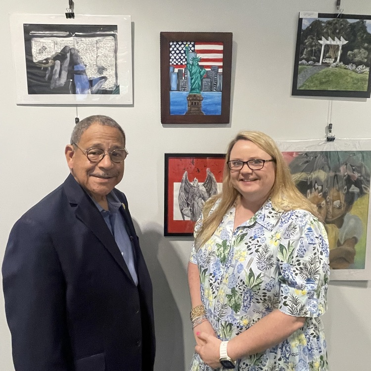 Mrs. Cole and Rep. Sanford Bishop admire the artwork of BHS students (exhibited in background) at the Albany Museum of Art. 