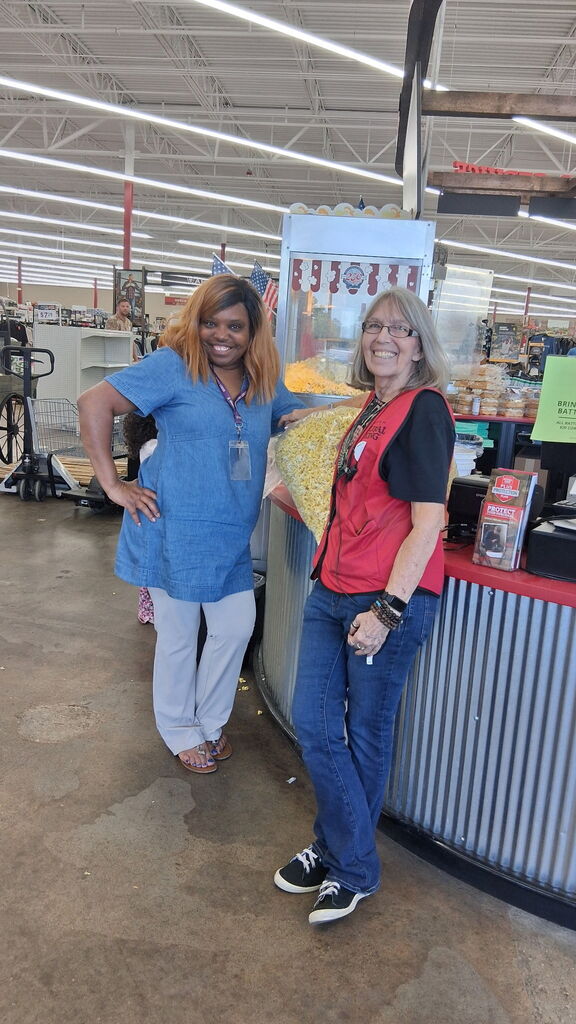 Ms. Crawford with Rural King and their donation of popcorn to BMS. 