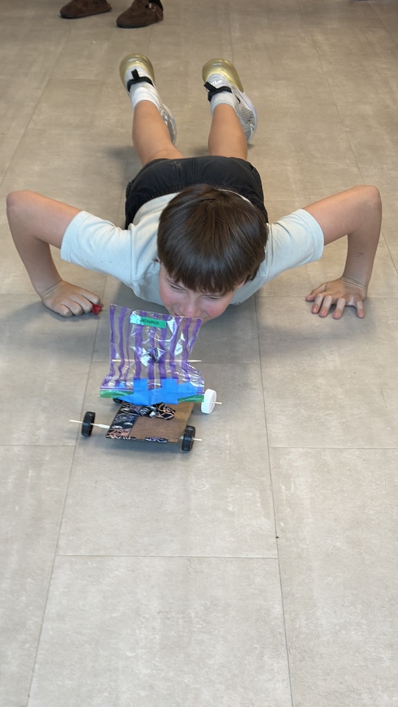 Student in Mr. Perry's Science class testing his project.