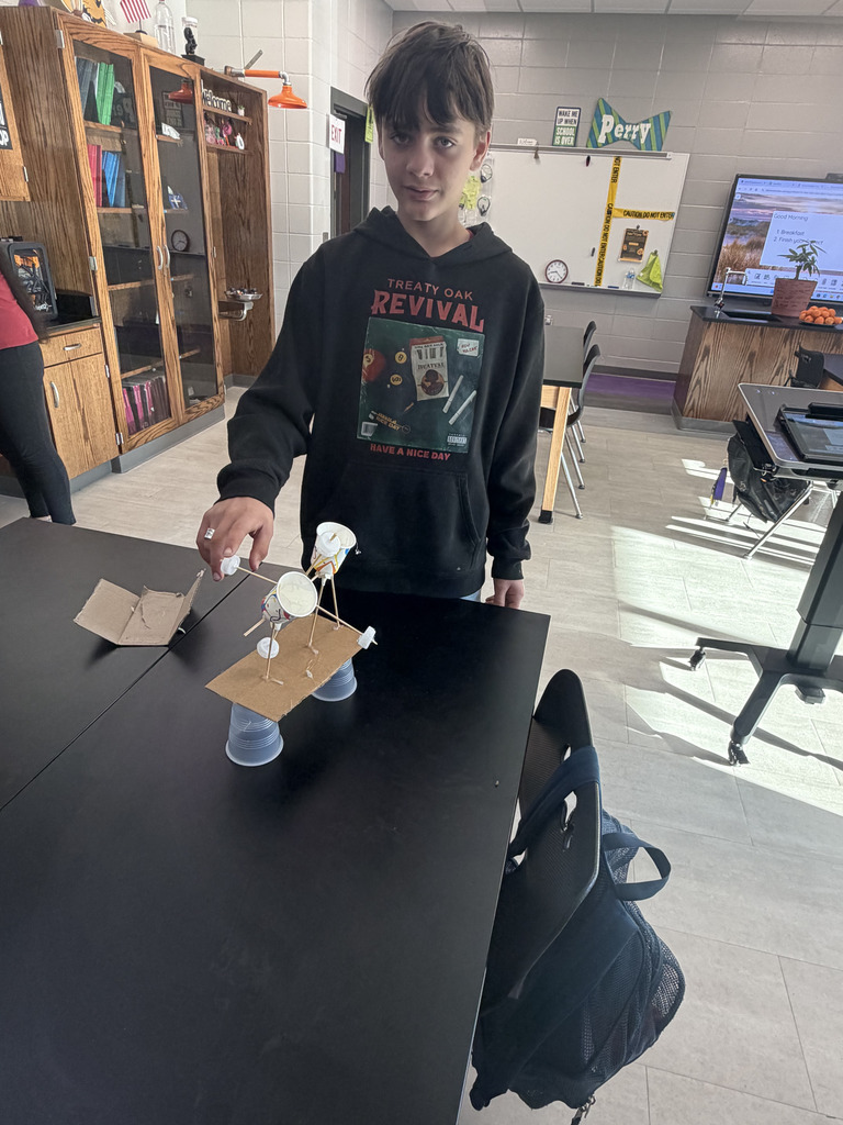 Student in Mr. Perry's Science class testing his project.