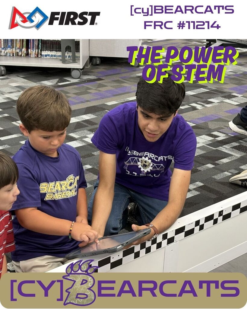 [CY]BEARCAT team members work with students during Summer STEM Camp learning to program Sphero Robots