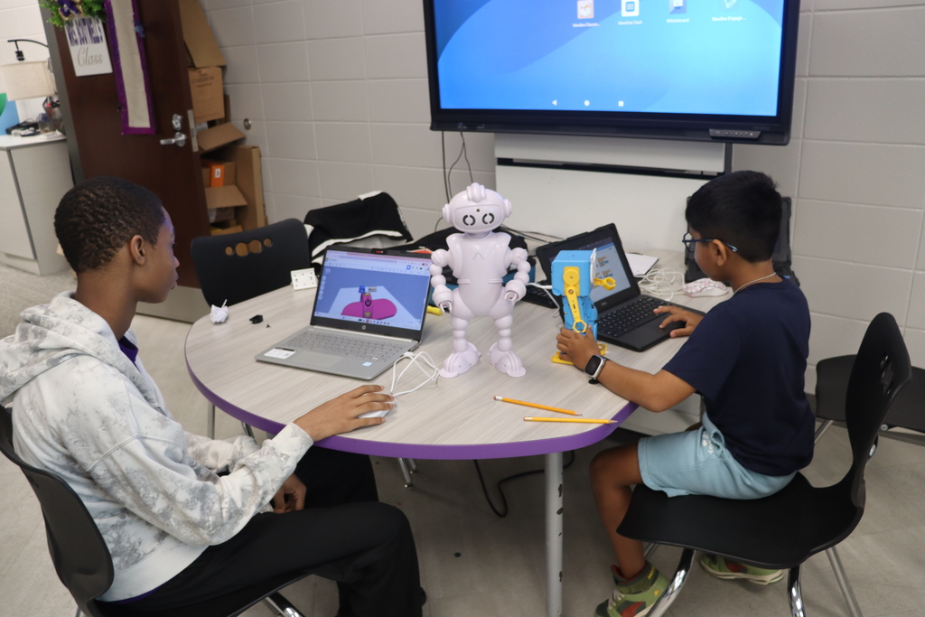 Students use 3D design software and robotics to create and test STEM projects during Summer STEM Camp.