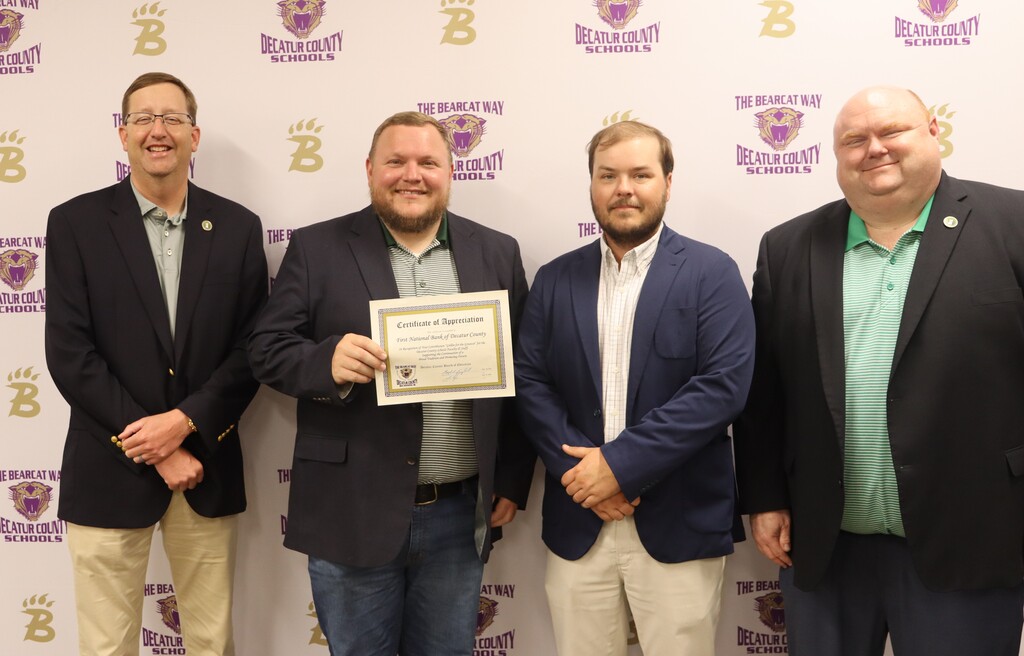 Community partners receive Certificates of Appreciation from Decatur County Schools during a Board of Education meeting in recognition of their support of the district's Year-Round Employee Appreciation Initiative.