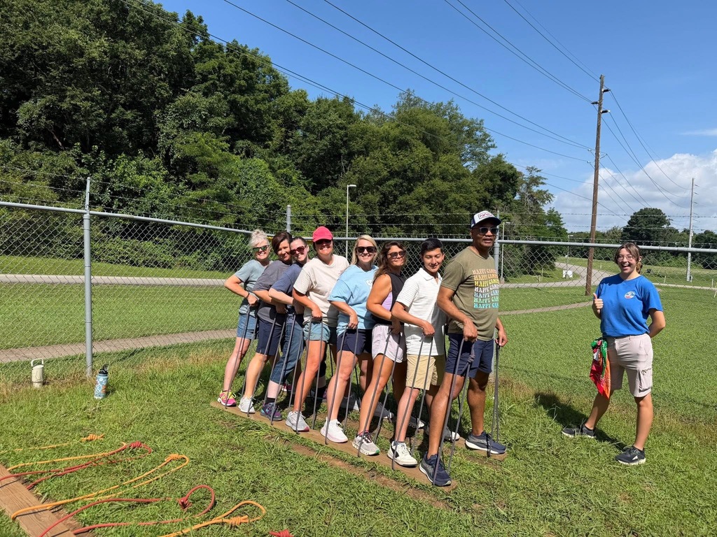 A collection of photos showing Hutto Elementary NASA HUNCH teachers participating in Space Camp activities, including astronaut training simulations, Mission Control exercises, team-building challenges, hands-on STEM workshops, and group photos at the U.S. Space & Rocket Center.