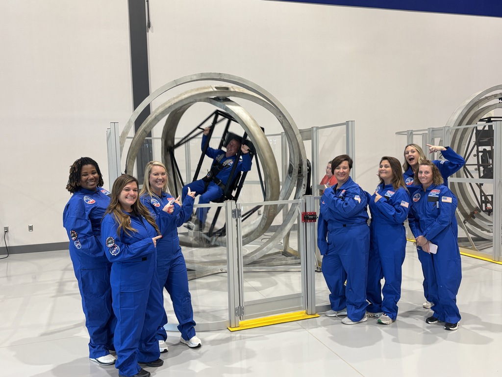 A collection of photos showing Hutto Elementary NASA HUNCH teachers participating in Space Camp activities, including astronaut training simulations, Mission Control exercises, team-building challenges, hands-on STEM workshops, and group photos at the U.S. Space & Rocket Center.