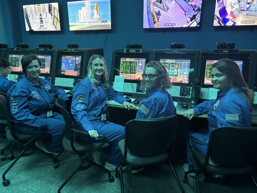 A collection of photos showing Hutto Elementary NASA HUNCH teachers participating in Space Camp activities, including astronaut training simulations, Mission Control exercises, team-building challenges, hands-on STEM workshops, and group photos at the U.S. Space & Rocket Center.