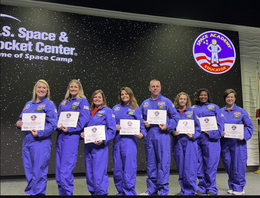 A collection of photos showing Hutto Elementary NASA HUNCH teachers participating in Space Camp activities, including astronaut training simulations, Mission Control exercises, team-building challenges, hands-on STEM workshops, and group photos at the U.S. Space & Rocket Center.