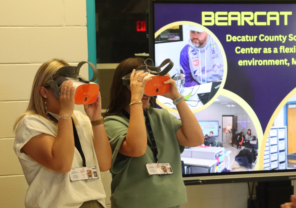 IMG_0983.JPG: New teachers explore virtual reality technology at the Bearcat Media Hub.