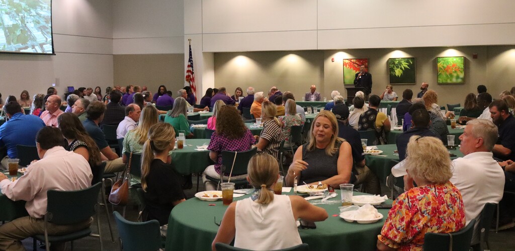 Photos from the August Chamber Connect Luncheon featuring Bainbridge Bearcat Head Football Coach Jamey DuBose speaking to community members and introducing Bearcat football players. First National Bank sponsored the event, which brought together Bearcat Football, school representatives, and community partners ahead of the upcoming football season.