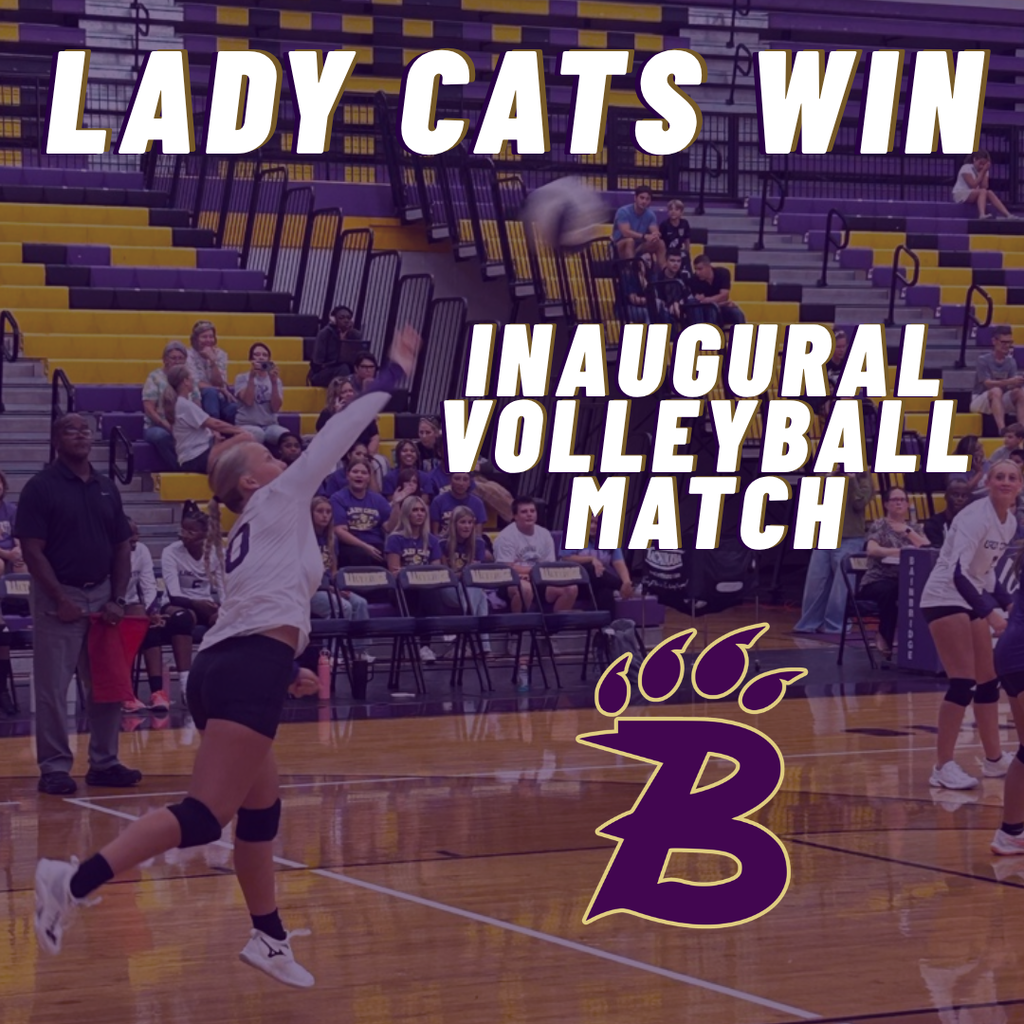 Lady Cats celebrate a 2-1 win over Baker County in their inaugural volleyball match.
