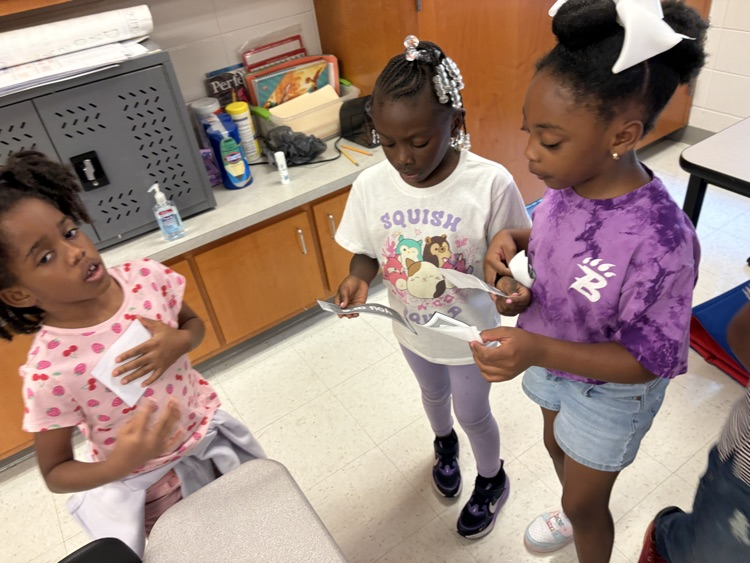 Ms. McMillan’s students walked around the room to find the person whose contraction matched their two words