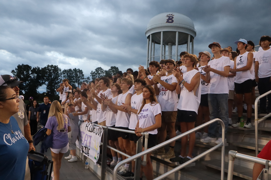 Bainbridge High School student section cheers beneath the Bearcat water tower.