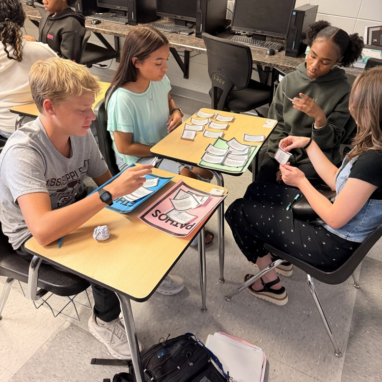 English II students sort statements according to the author's mode of persuasion. 