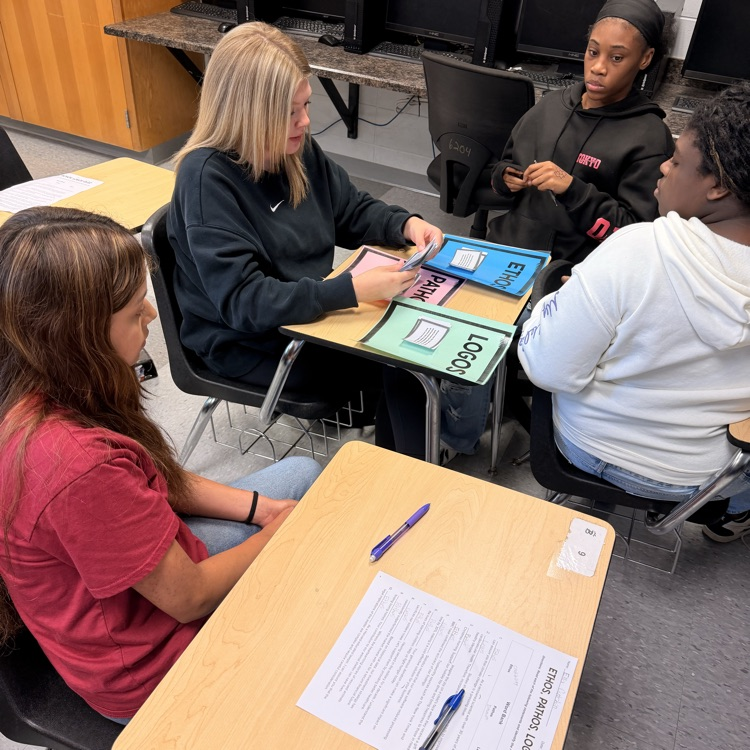 English II students sort statements according to the author's mode of persuasion. 