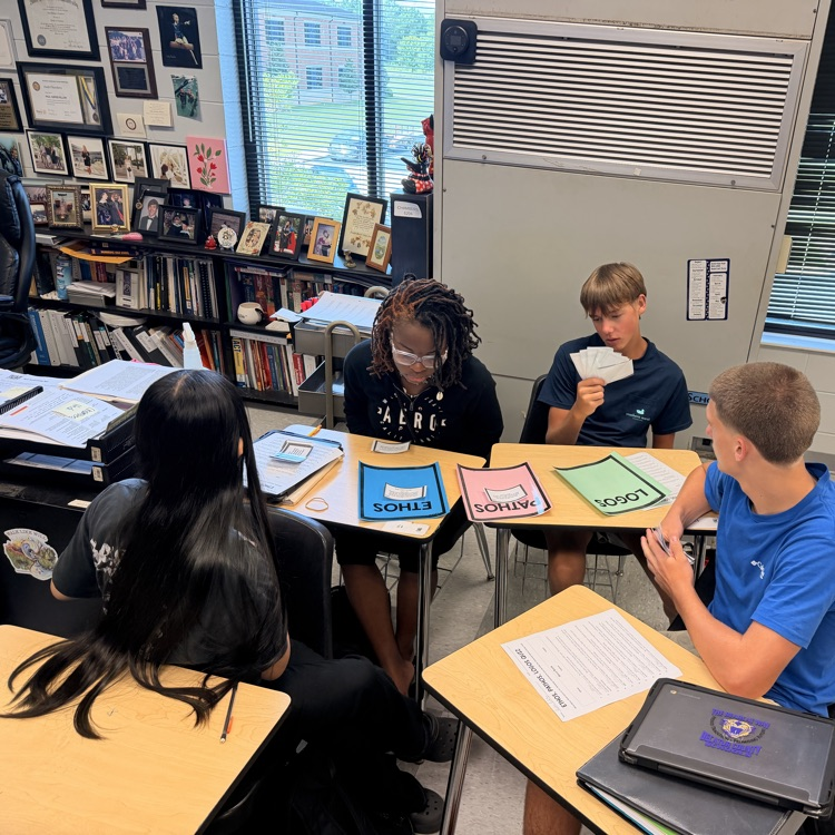 English II students sort statements according to the author's mode of persuasion. 