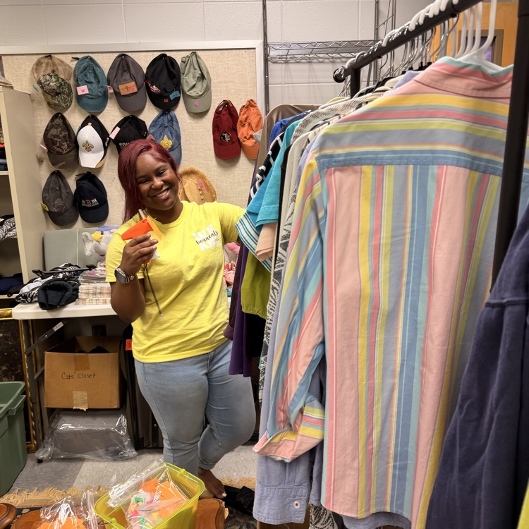 Anchor Club members help sort and price items for their mega yard sale which will be August 14th