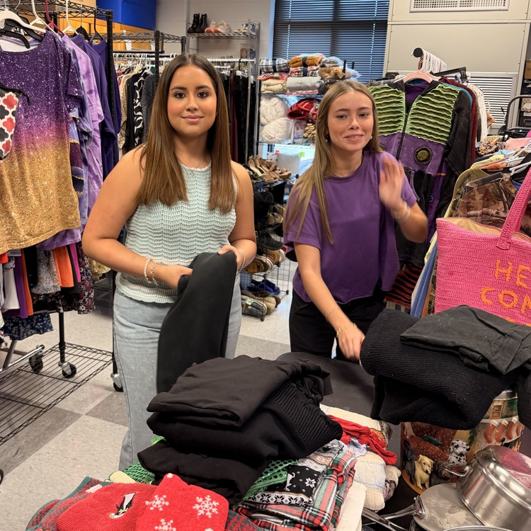 Anchor Club members help sort and price items for their mega yard sale which will be August 14th