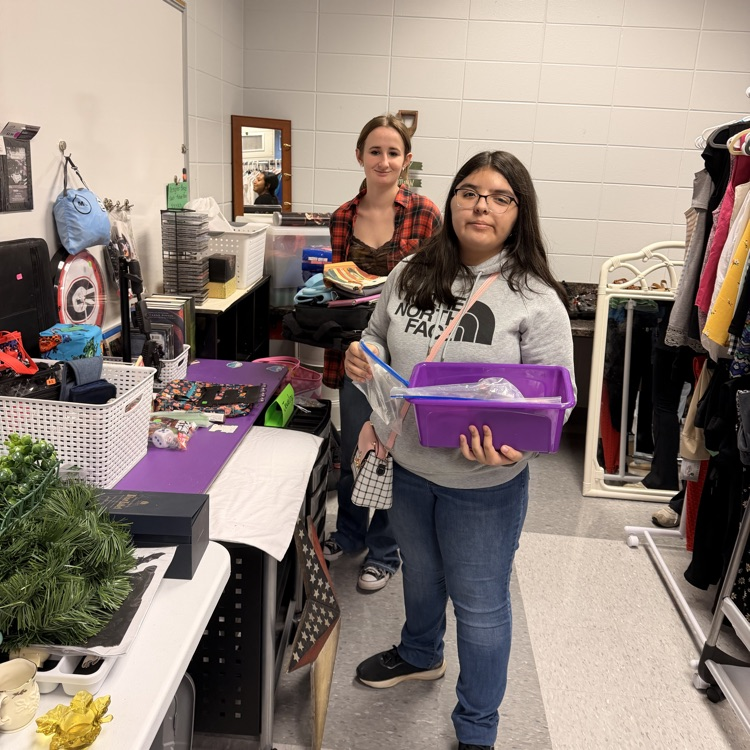 Anchor Club members help sort and price items for their mega yard sale which will be August 14th