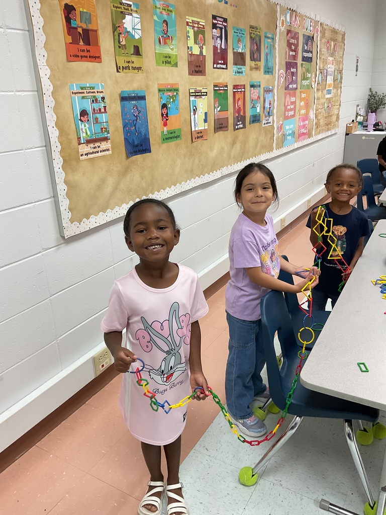 Students collaborating to create.