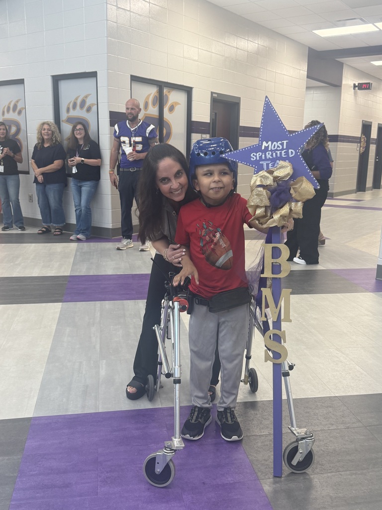 Photos from Bainbridge Middle School’s Homecoming Pep Rally featuring cheerleaders, students showing school spirit, and the BMS drumline performing in purple and gold.