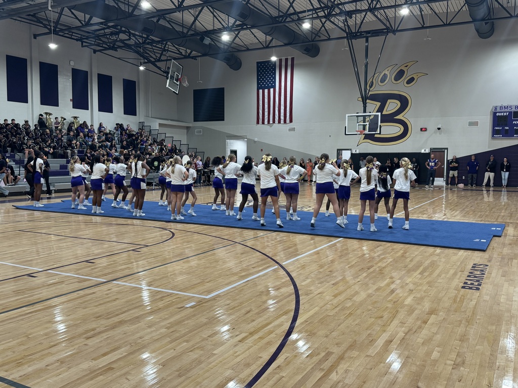 Photos from Bainbridge Middle School’s Homecoming Pep Rally featuring cheerleaders, students showing school spirit, and the BMS drumline performing in purple and gold.