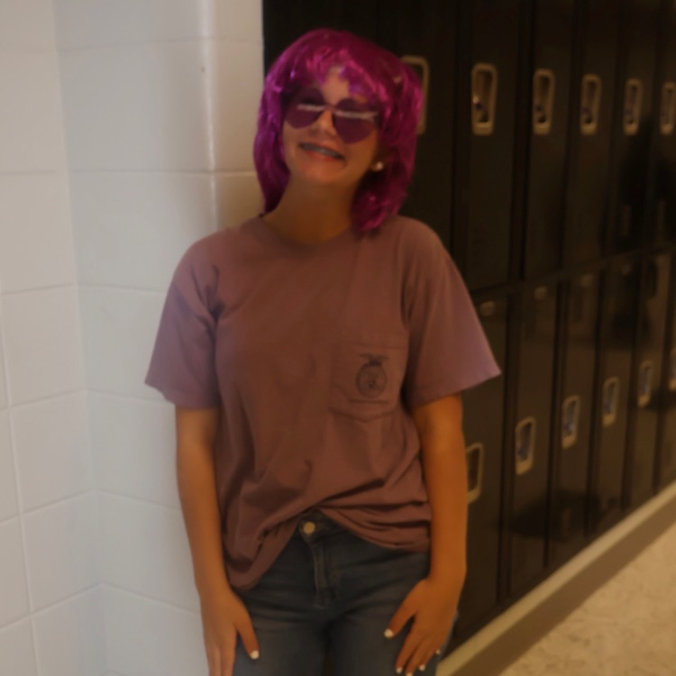 Cheering on the Bearcats in our purple and gold- HOCO Day 4