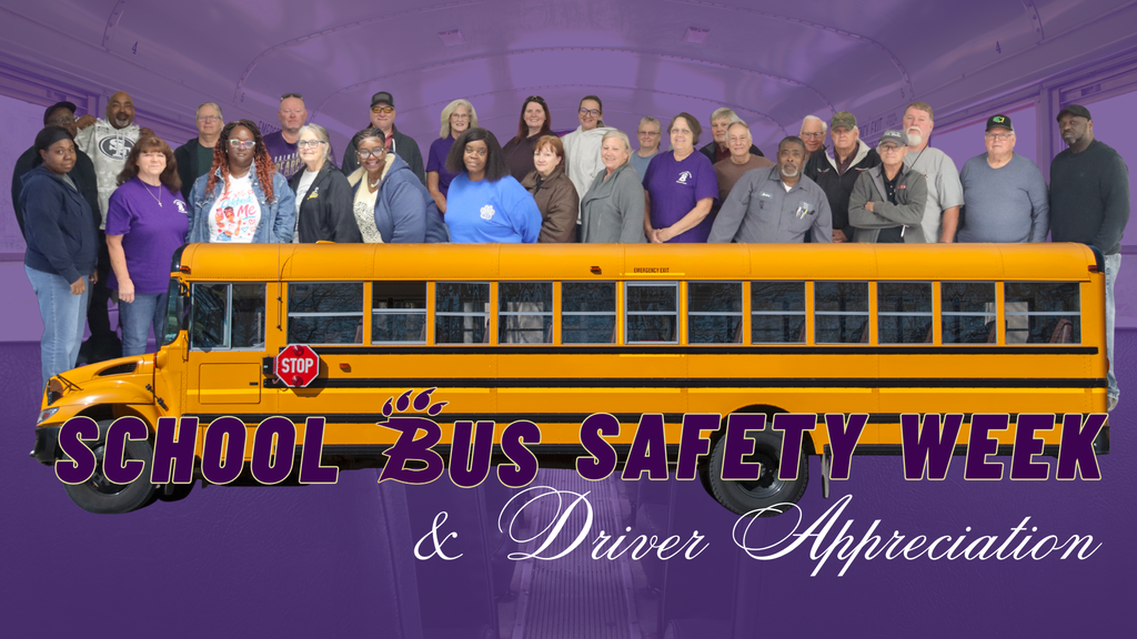 Group photo of Decatur County Schools transportation staff behind a yellow school bus, with purple and gold lettering reading “School Bus Safety Week & Driver Appreciation.”