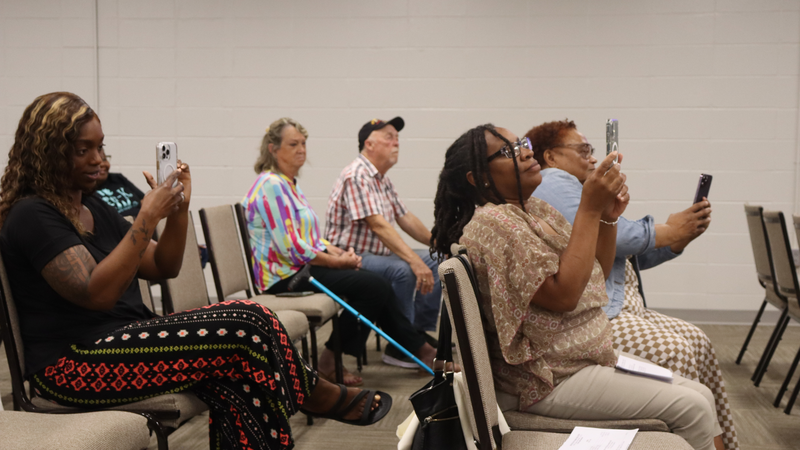 Decatur County Schools staff, students, and community members participate in an awards and recognition ceremony, receiving certificates, plaques, and honors.