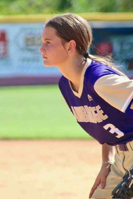 Girl Softball Player focusing on the game play. 