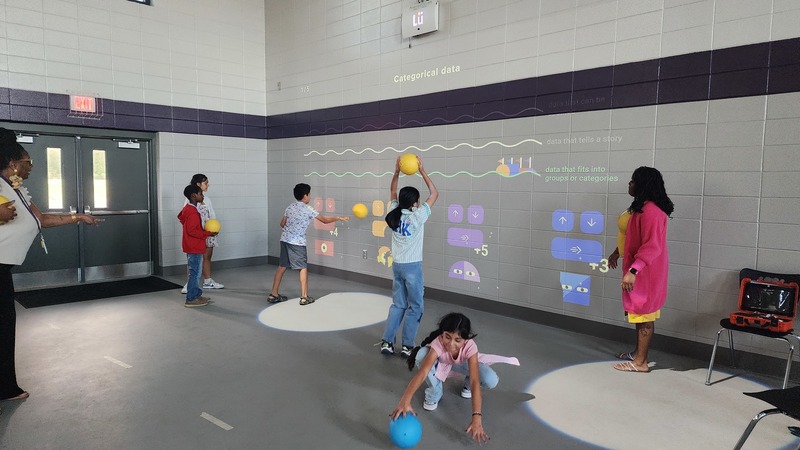 Students play Math Game on the interactive Lu
