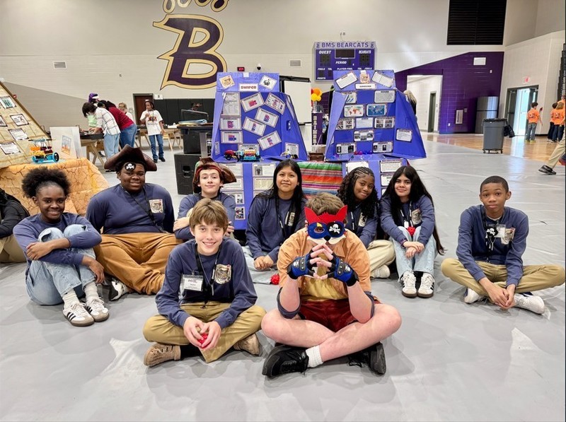 Students of the BMS Robotics Team with their project. 