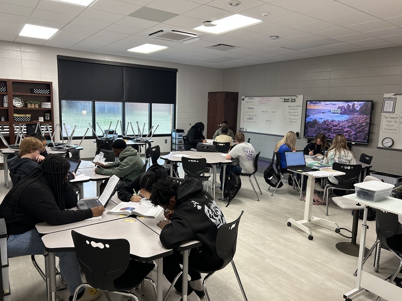 8th Grade students work together to learn ELA standards. 