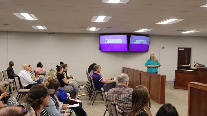 Audience members attend the Decatur County Schools February board meeting.