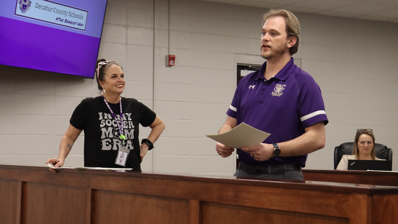 Bainbridge Middle School educators present and recognize the robotics teams at the board meeting.