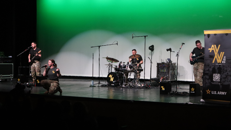 The U.S. Army Field Band’s “As You Were” performs a live rock concert on stage at the Performing Arts Center.